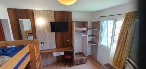 Postel nebo postele na pokoji v ubytování Hostel Casa Cinderella