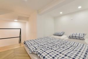 Кровать или кровати в номере Apartmán s balkónom