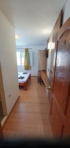 Postel nebo postele na pokoji v ubytování Hostel Casa Cinderella