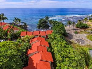 an aerial view of a house with the ocean in the background at Keauhou Kona Surf Racquet 2101 in Kailua-Kona