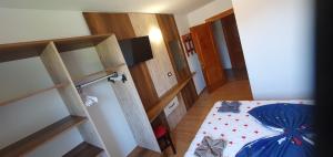 Postel nebo postele na pokoji v ubytování Hostel Casa Cinderella