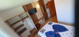 Postel nebo postele na pokoji v ubytování Hostel Casa Cinderella