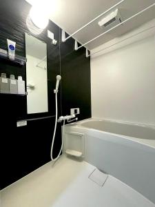 Koupelna v ubytování guesthouse Nakatsu