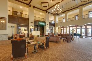 a large lobby with chairs and a grand piano at Keestone Resort Apartment about 7 Mi to State Park 