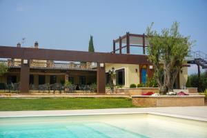 a house with a swimming pool in front of it at Agriturismo Casacchella in San Nico
