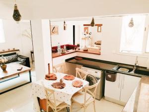 مطبخ أو مطبخ صغير في Spacieuse et Cosy