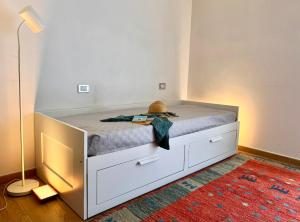 Кровать или кровати в номере Sopra u mare