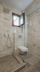 Ένα μπάνιο στο Callisto Private Pool Villa, Pefkohori