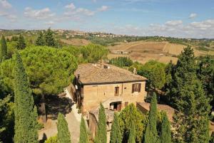 an aerial view of a house in the trees at Casa cecchi siena in Siena