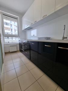 Kuchyň nebo kuchyňský kout v ubytování Euforia apartment