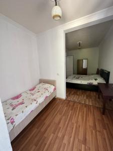 Letto o letti in una camera di Zuri Kvariati