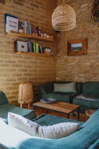 Posezení v ubytování ECOTurisme Can Buch HOTEL