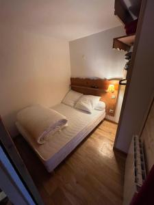 Postel nebo postele na pokoji v ubytování Chamrousse Appart 8 personnes au pied des pistes