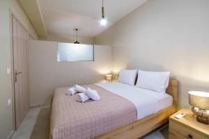Postel nebo postele na pokoji v ubytování Palm home 1