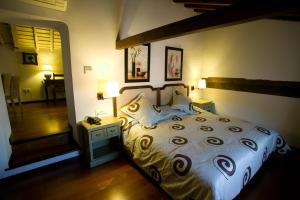 A bed or beds in a room at Hotel Spa La Casa Del Convento