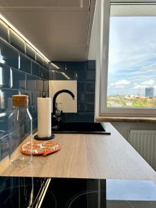 Dapur atau dapur kecil di Apartament z widokiem na Gdańsk i Zatokę
