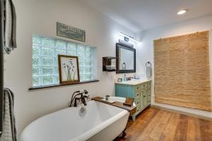 a bath tub in a bathroom with a window at Secluded Marathon Hideaway w/ Fire Pit + Views! in Marathon +21 photos