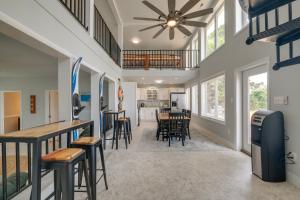 a kitchen and dining room with a ceiling fan at Vacation Rental House Situated on Chesapeake Bay in Ridge