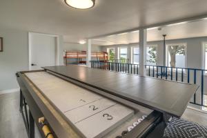a large ping pong table in a house at Vacation Rental House Situated on Chesapeake Bay in Ridge