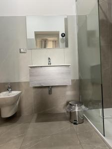 Kúpeľňa v ubytovaní Akoya Rooms Capo Vaticano
