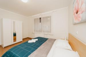 Posteľ alebo postele v izbe v ubytovaní Jankovi Dvori + 19 fotografií