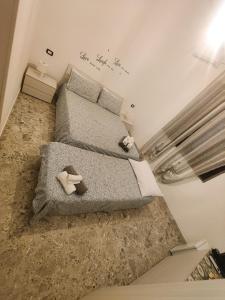 a small room with two beds in a room at Villa Turicchio in Taranto +49 photos