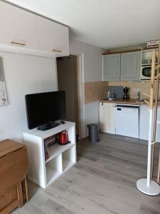 Kuchyňa alebo kuchynka v ubytovaní Studio Cabine RDC Pied des Pistes
