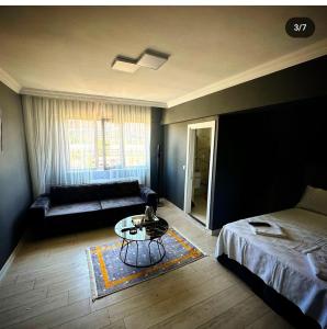 Postel nebo postele na pokoji v ubytování Arena Resort Otel Kagıthane