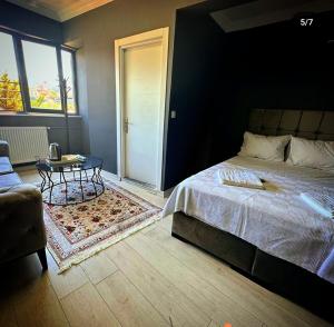 Postel nebo postele na pokoji v ubytování Arena Resort Otel Kagıthane
