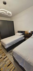 Tempat tidur dalam kamar di Marina Marassi, North Coast