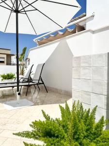Zdjęcie z galerii obiektu Apartamento dúplex con piscina privada en terraza w mieście Alcalá de Guadaira