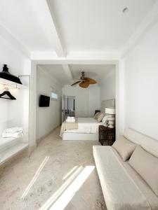 Łóżko lub łóżka w pokoju w obiekcie Apartamento dúplex con piscina privada en terraza