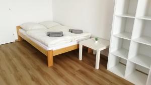 Postel nebo postele na pokoji v ubytování Apartmány Orlík - Loužek