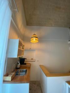 Kuchyň nebo kuchyňský kout v ubytování A Casa del Console apartment