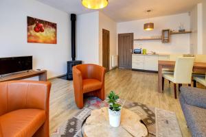 Kuchyň nebo kuchyňský kout v ubytování Apartments Čerešňový Sad & Wellness