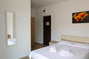 Postel nebo postele na pokoji v ubytování Summer Rest
