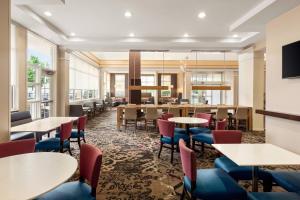 a dining room with tables and chairs at Residence Inn Chattanooga Near Hamilton Place in Chattanooga