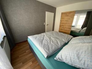 Postel nebo postele na pokoji v ubytování Haus Rosa