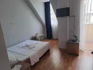 Postel nebo postele na pokoji v ubytování Hotel Zundaga