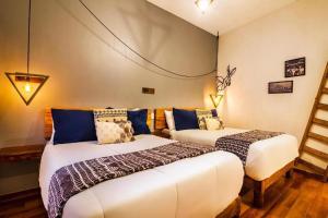 Postel nebo postele na pokoji v ubytování Hotel Kali + 22 fotografií