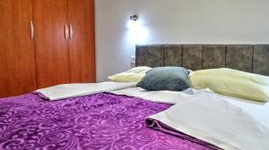 Postel nebo postele na pokoji v ubytování Apartment Daca