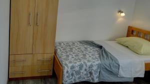 Postel nebo postele na pokoji v ubytování Apartment Daca