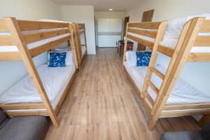 Postel nebo postele na pokoji v ubytování Rekreačné stredisko Patince - Family Resort