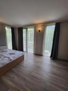 Letto o letti in una camera di Mestia Roots