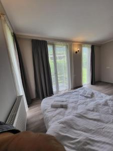 Letto o letti in una camera di Mestia Roots
