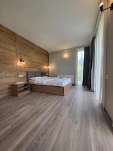 Letto o letti in una camera di Mestia Roots