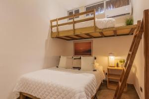 Ένα ή περισσότερα κρεβάτια σε δωμάτιο στο Hotel Michanti