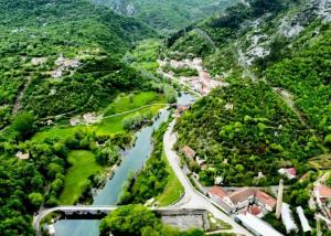 an aerial view of a river in a valley at Apartman Rijeka Crnojevica in Rijeka Crnojevića