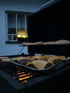 a grill with some food on top at Chalupa Kalamajka in Horní Štěpánov
