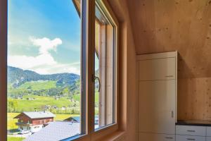 Afbeelding uit fotogalerij van Bergreich Appartement 5 in Schoppernau